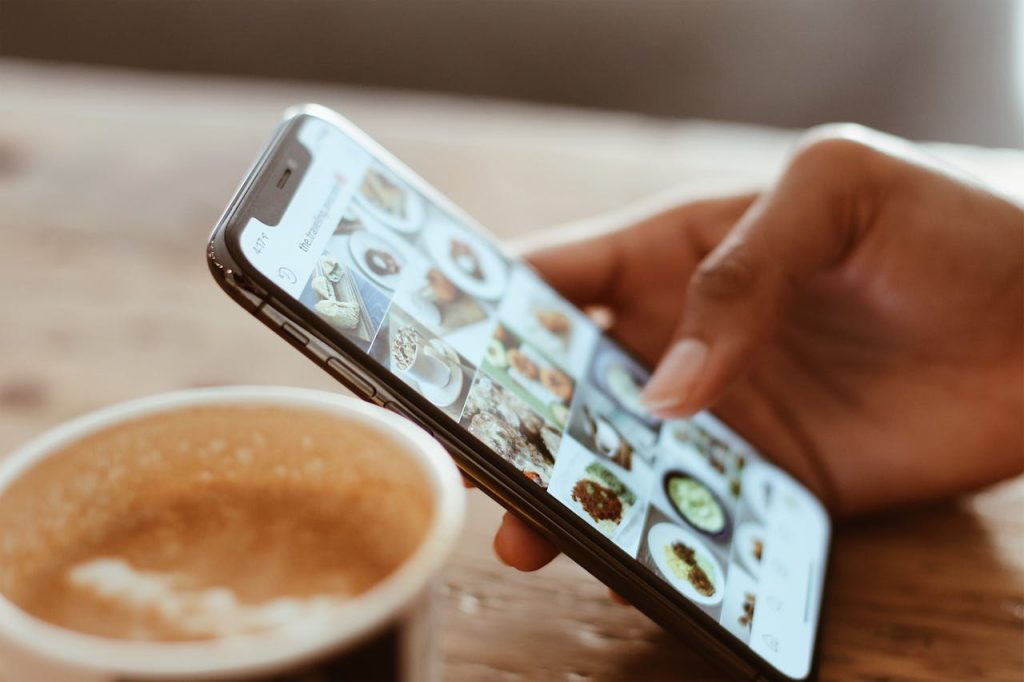 woman searching on her iphone