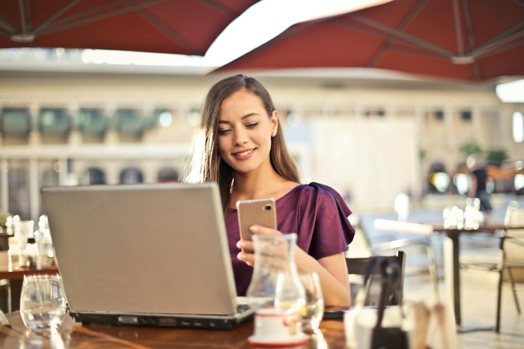 Small business branding woman working on her iphone